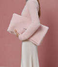 Soft Clutch bag made of fluffy yarn pink