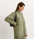 Oversized sweater with olive slits