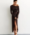 A suit with top an asymmetric neck and a scented skirt chocolate