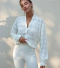 Blouse of openwork knitting milk