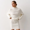 Sweater with a geometric print milk