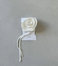 Rose on thin ribbon milk