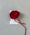 Rose on thin ribbon red