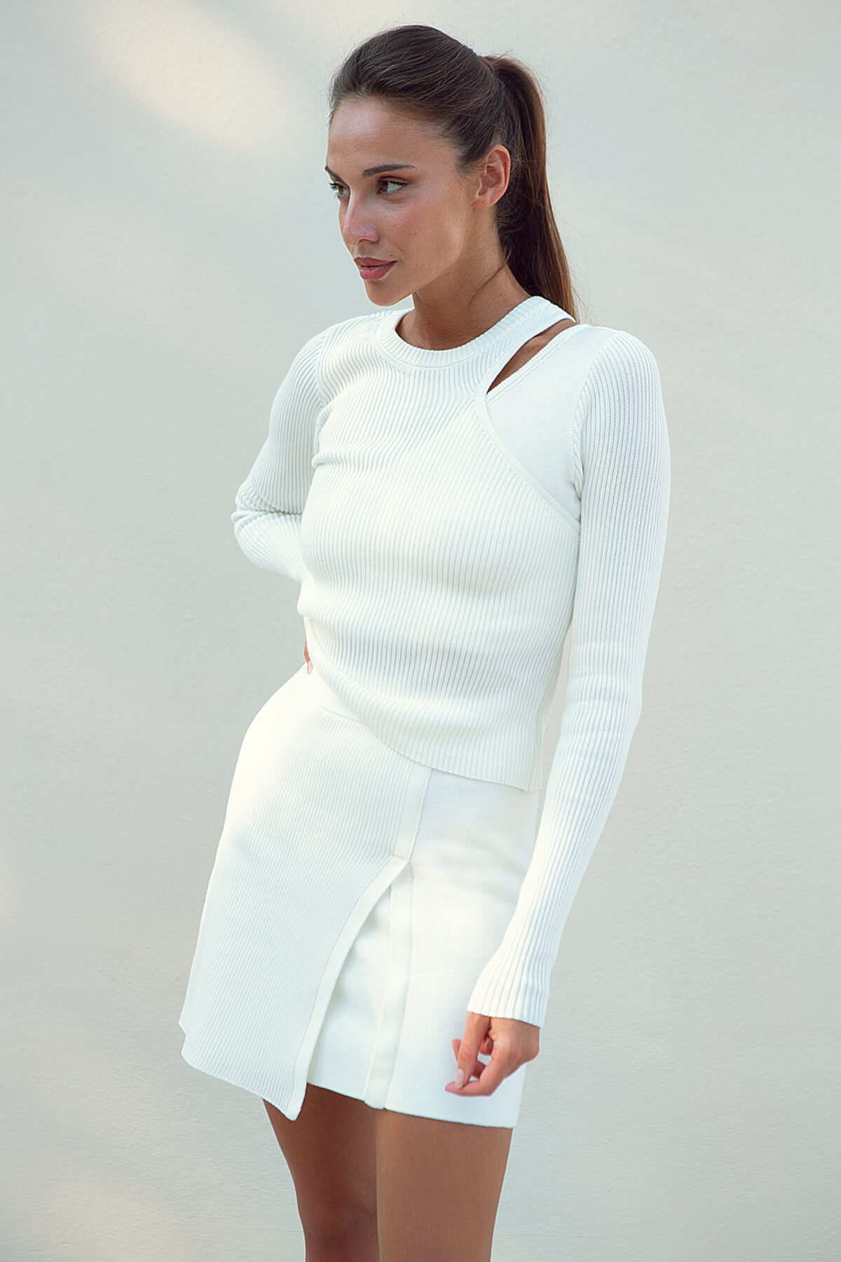 Asymmetric milk-colored mini skirt by 25 UNION