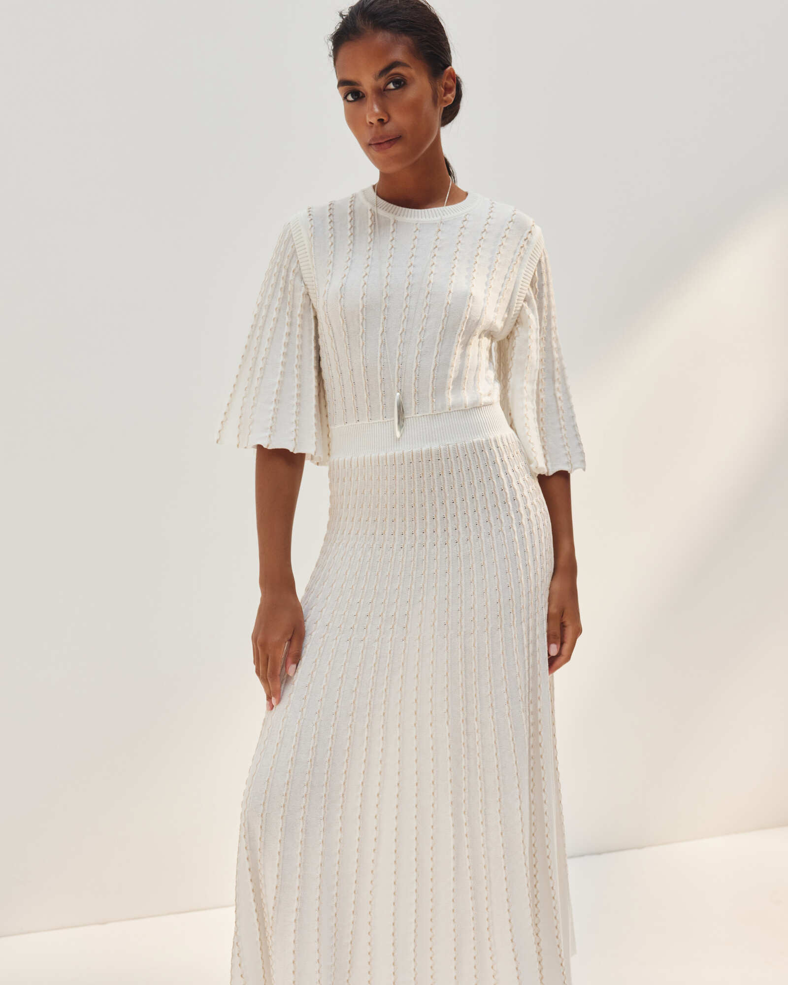 Knitted openwork dress with short elbow-length sleeves, photo 25 Union Kazakhstan